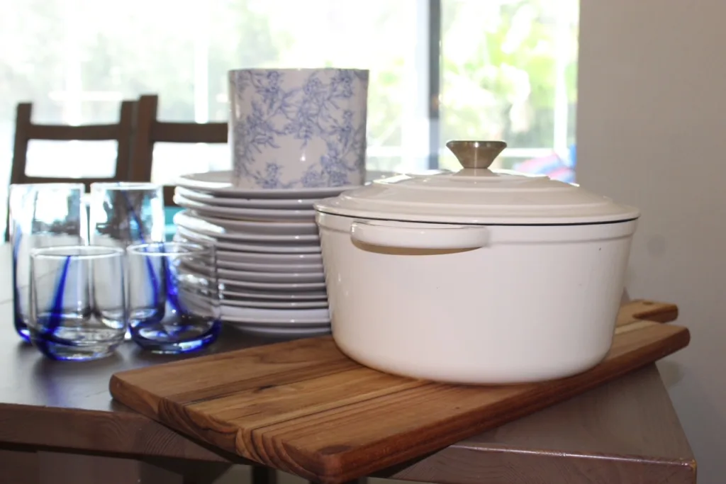 Kitchen dishes, cookware, and household items prepared for estate cleanouts and junk removal services by Dumpster Crews.