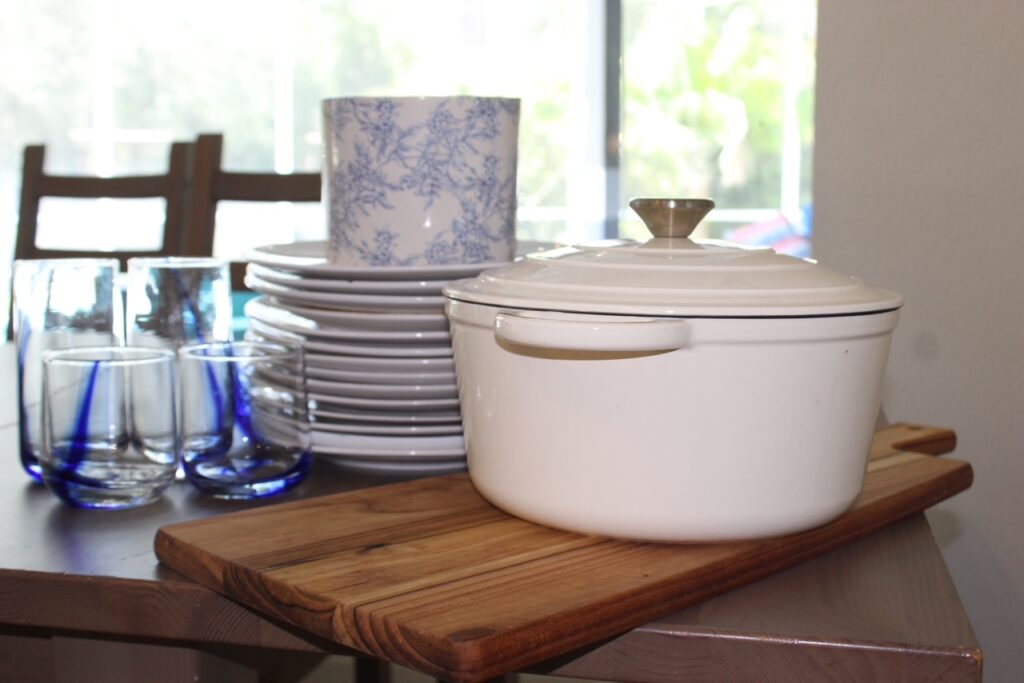 Kitchen dishes, cookware, and household items prepared for estate cleanouts and junk removal services by Dumpster Crews.