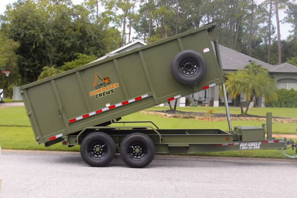 Book Now - Trailer Parked in Orlando for Dumpster Rental Service by Dumpster Crews